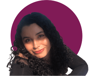 Headshot of Jazmin Barajas, a Mexican-American woman with long curly dark hair.