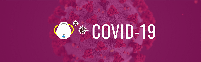 Banner text: COVID-19. Icon of N-95 mask with tiny WID globe on the filter, and two oversized coronavirus molecules. Background photo of an enlarged illustration of COVID molecules with magenta tint.