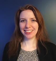 Author photo of Emma Alpern, a white woman with shoulder length brown hair smiling.