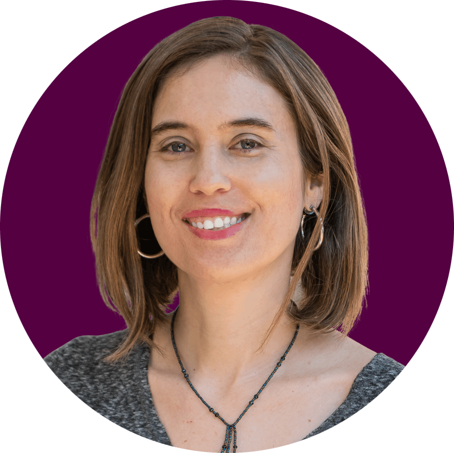 Kate Anderson, a white woman with medium length brown hair smiles.