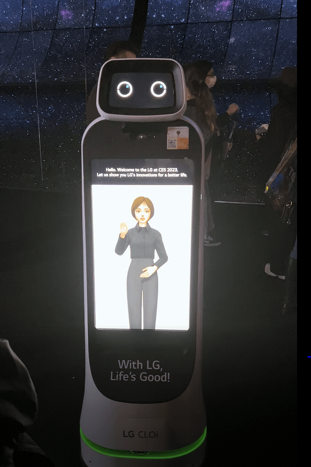 LG CLOi Guidebot with virtual sign language interpreter on screen.
