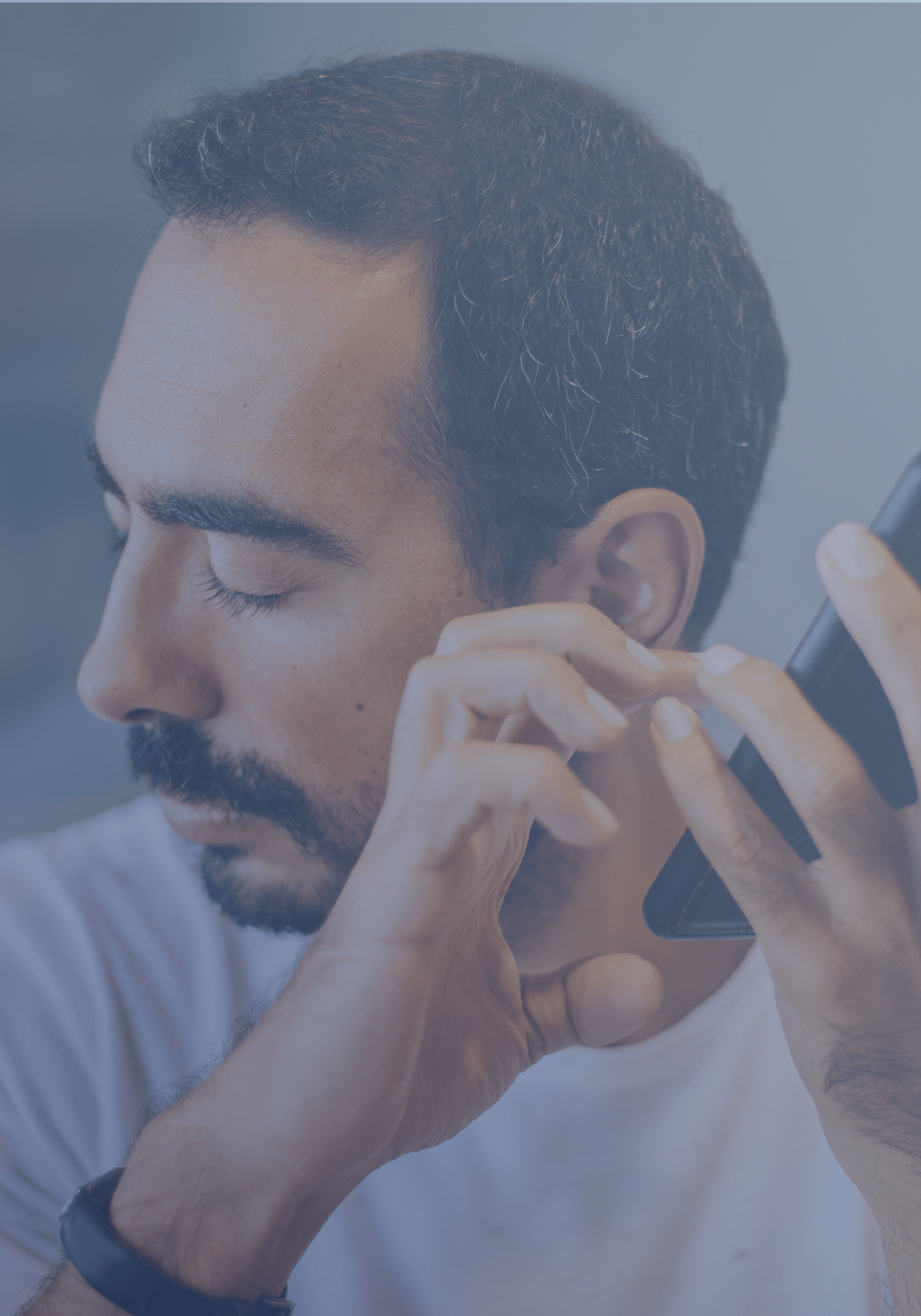 A blind man using his phone