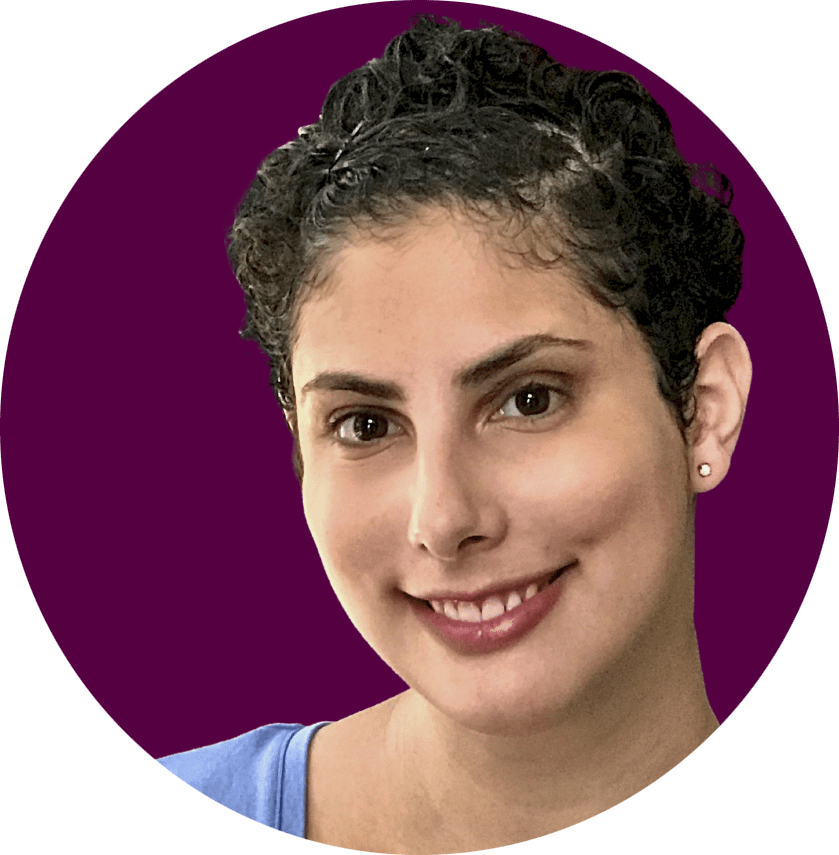 Headshot image of Drew Dakessian, a white woman with short black hair.