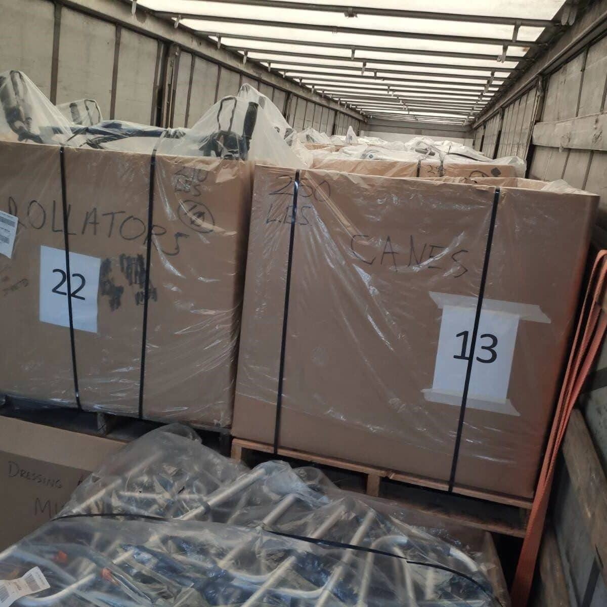 Large cardboard boxes packed in the back of a semi-trailer truck on their way to Ukraine